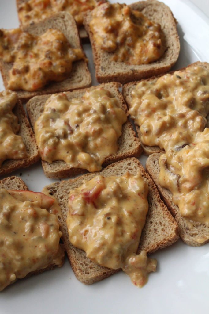 Sausage Hanky Panky Dip on Rye Bread plated on white plate