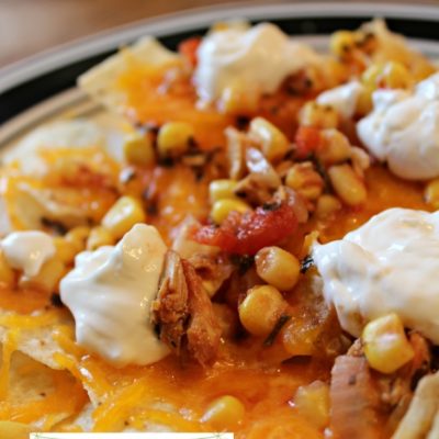 Chicken Tortilla Nachos (via MyHeavenlyRecipes.com) - These homemade chicken nachos are amazing. How can you go wrong with cheese and chips?