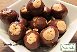 Peanut butter balls dipped in chocolate in white bowl