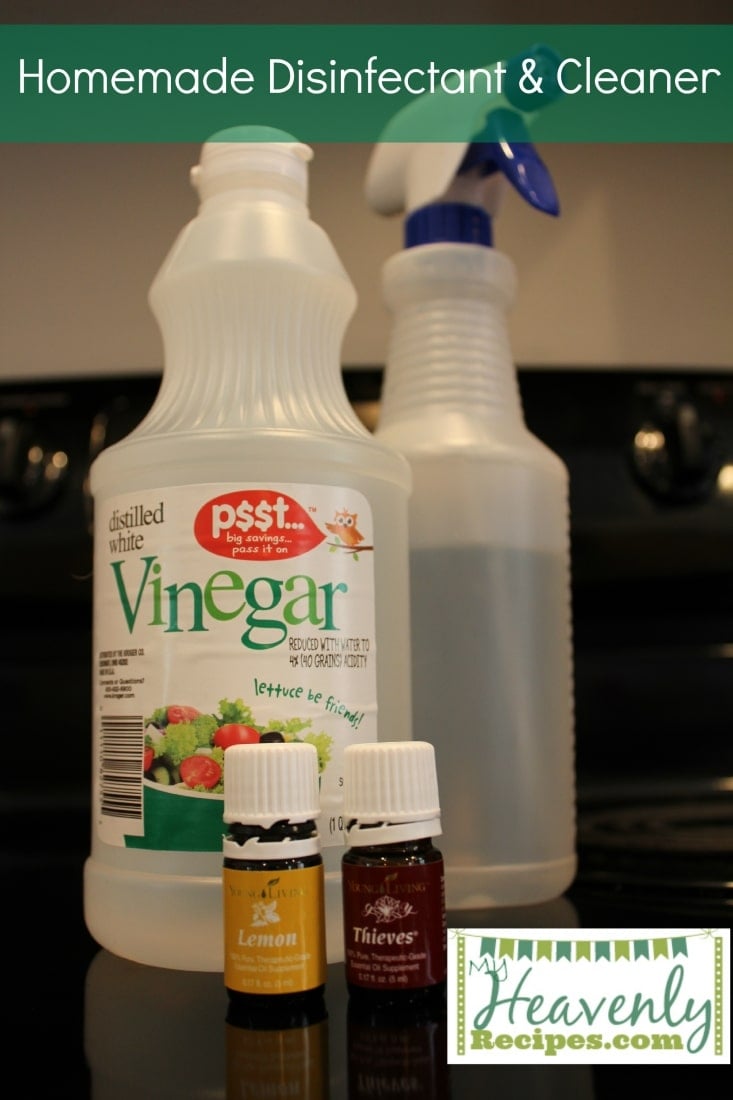 spray bottles of homemade cleaner with essential oils