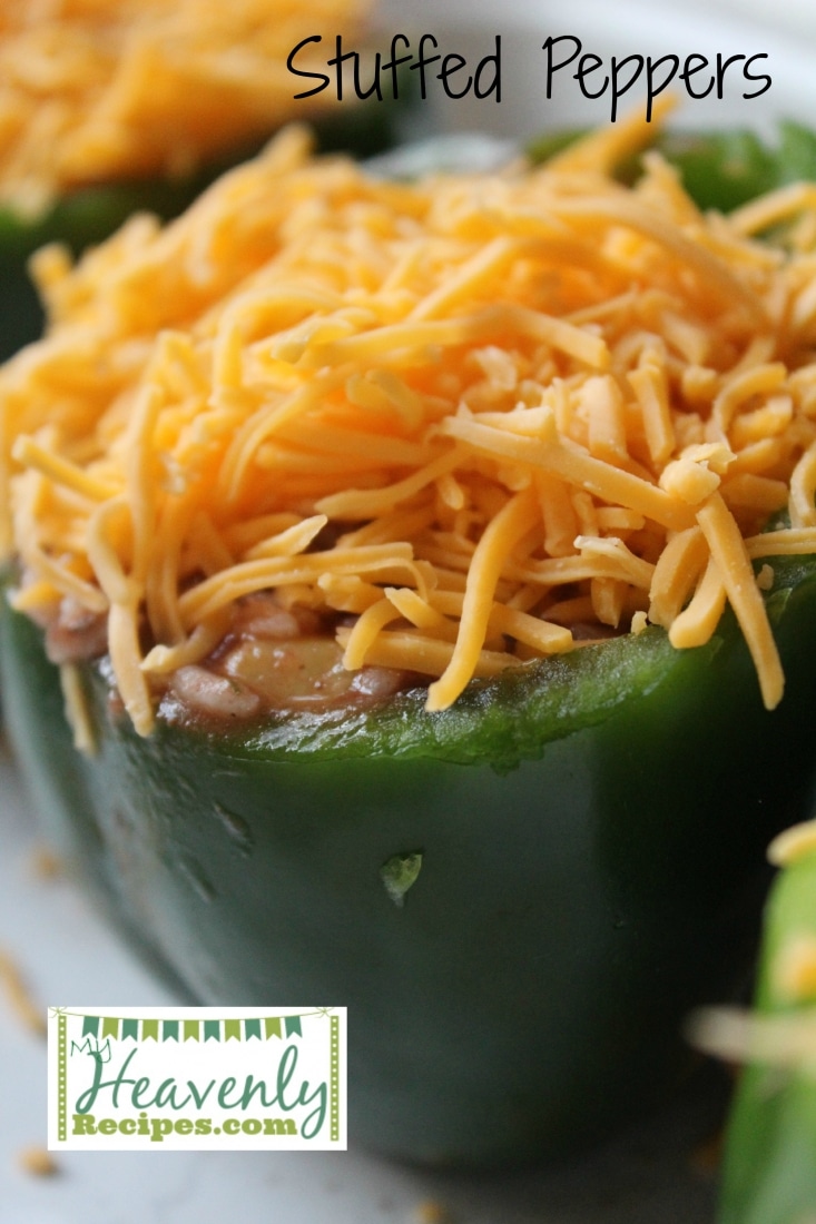 stuffed bell peppers topped with shredded cheddar cheese
