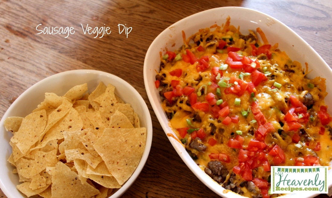 sausage dip with tomatoes, onions, and cheese