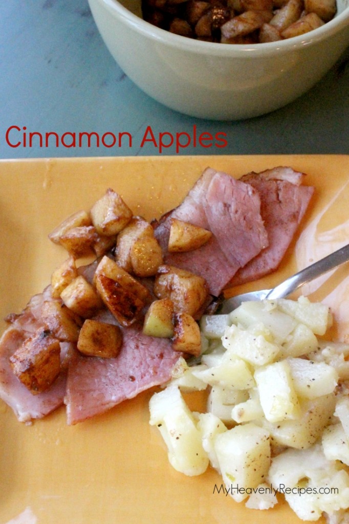cinnamon apples on plate with ham and foiled potatoes