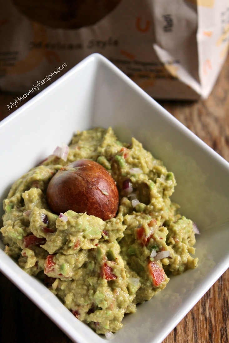 homemade guacamole in a white bowl