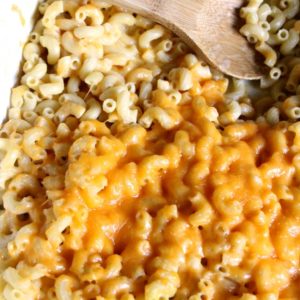 vertical macaroni and cheese in white baking dish