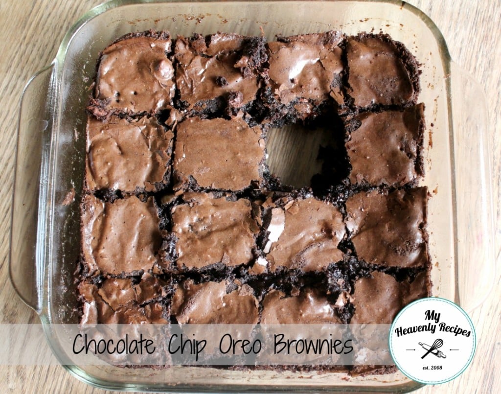 chocolate chip oreo brownies in a 8x8 baking dish with a piece missing