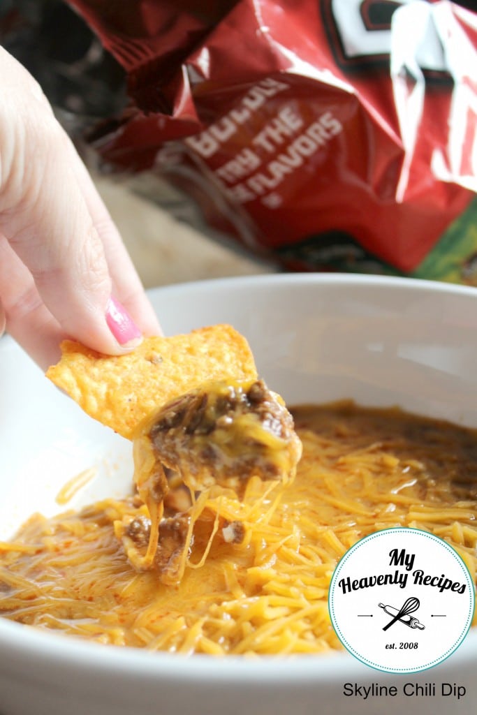 skyline dip served in a white bowl with a bag of doritos in the background