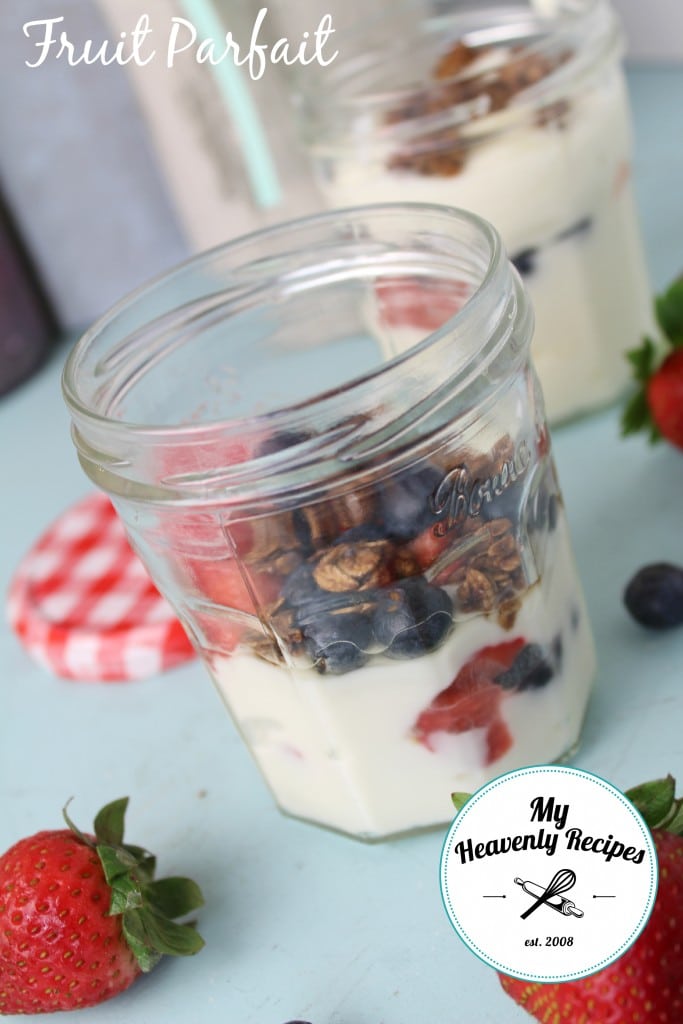 Fruit Parfait made with yogurt, granola and fresh berries, served in a mason jar