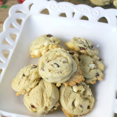 cranberry cookies with white chocolate chips on a white serving platter