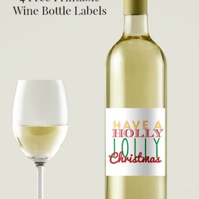 free printable label that says "Have a Holly Jolly Christmas" glued to a wine bottle
