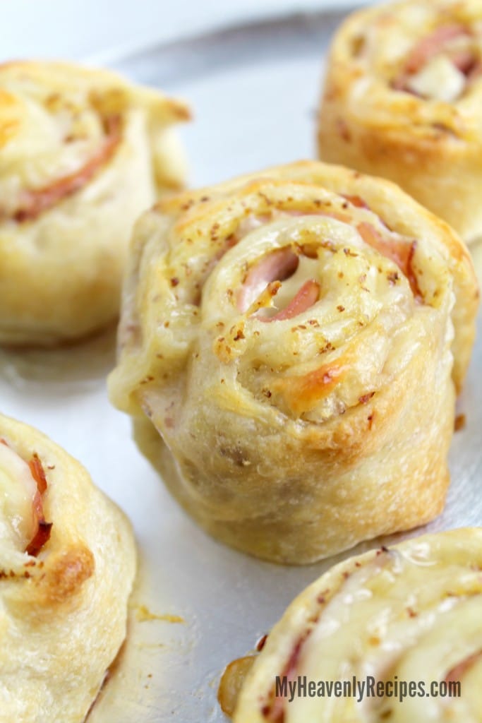 ham and cheese roll up recipe close up on a white plate