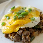 fried egg over sausage hash