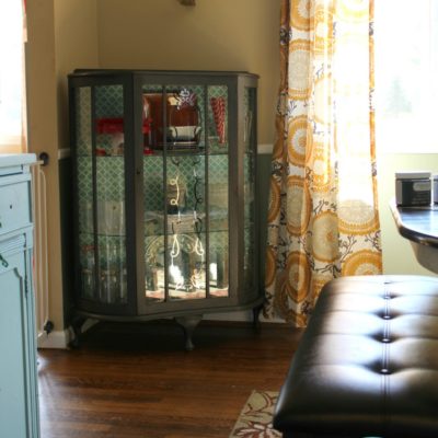 photo shows a curio cabinet makeover
