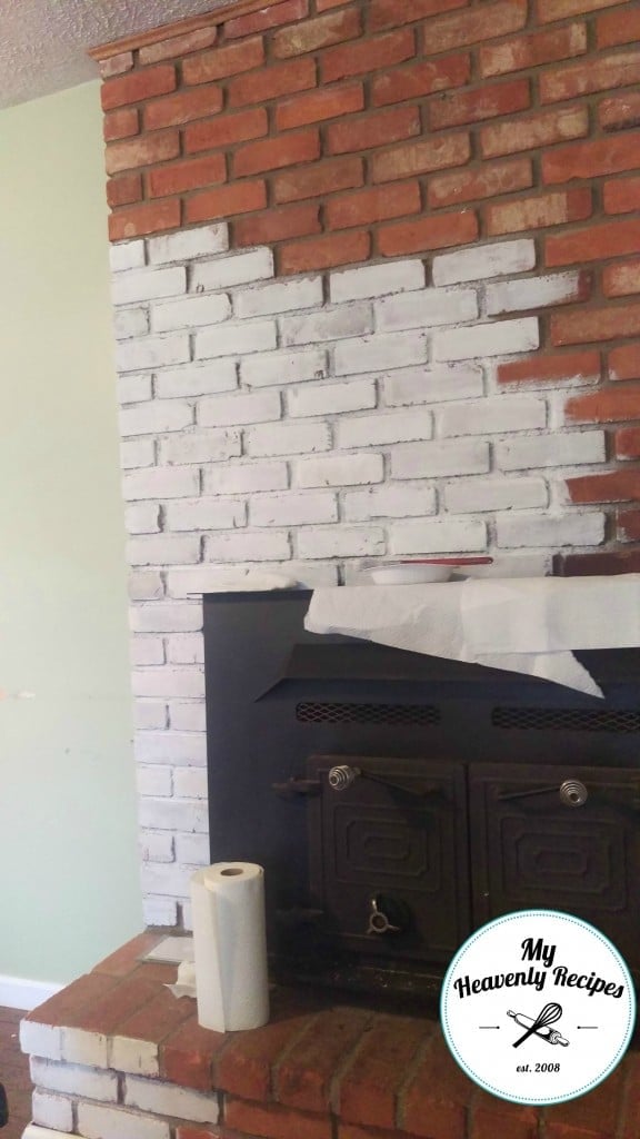 painting a brick fireplace with white chalk paint