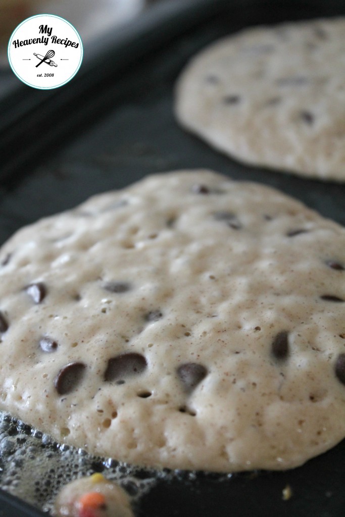 Chocolate Chip Pancakes cooking in a pan