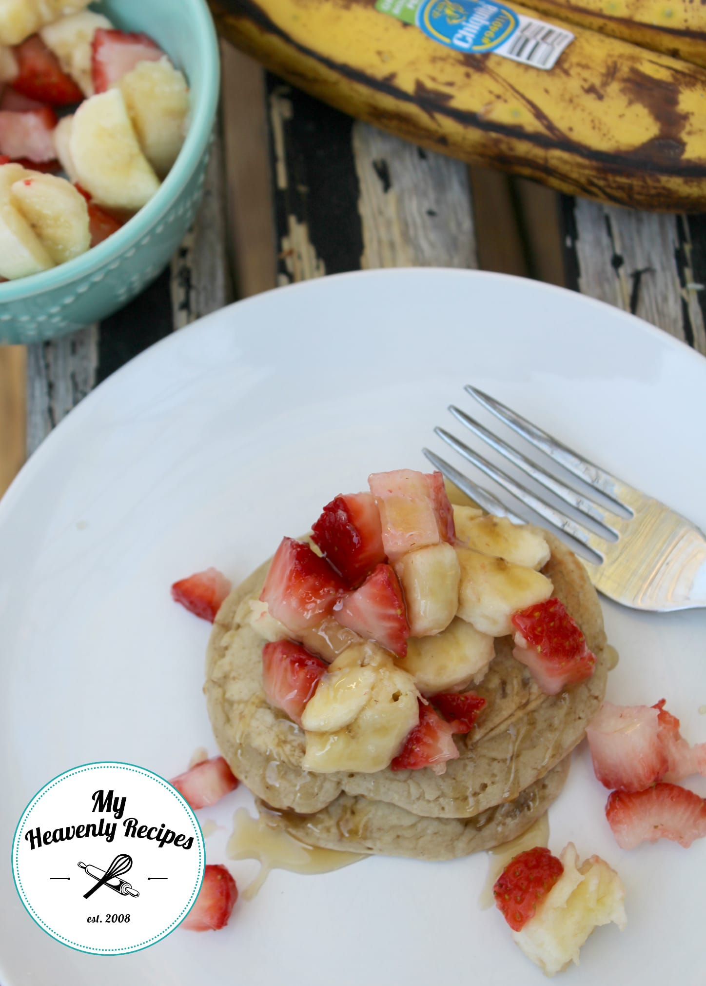 Top these Healthy Banana Pancakes with strawberries and bananas for a over the top breakfast recipe.