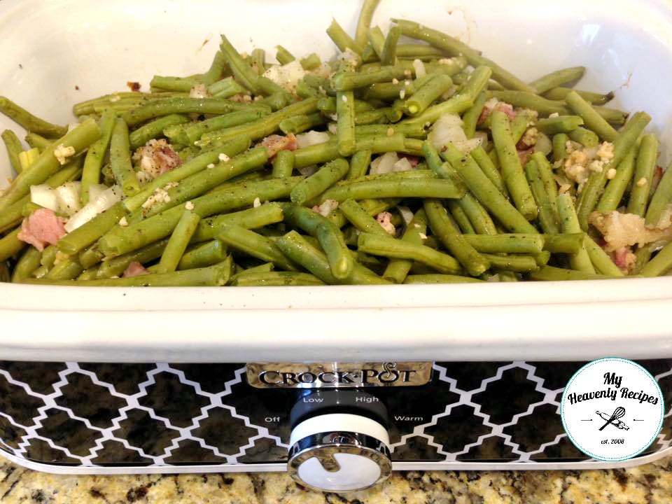 slow cooker green beans recipe being cooked in a Crock Pot