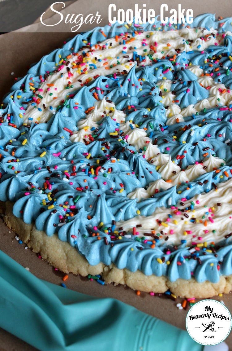 sugar cookie cake decorated with blue and white whipped buttercream frosting