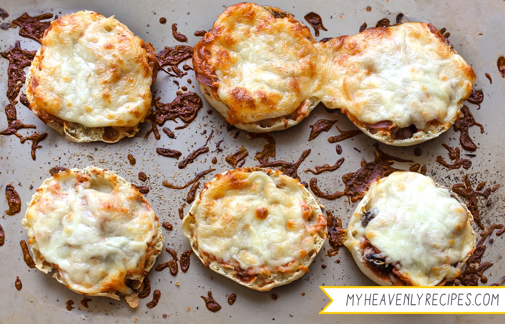 six english muffin pizzas cooked and melty cheese