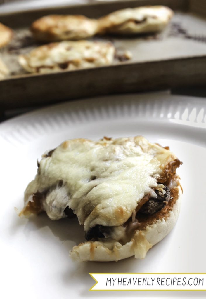 vertical english muffin pizza cooked with mushroom and cheese