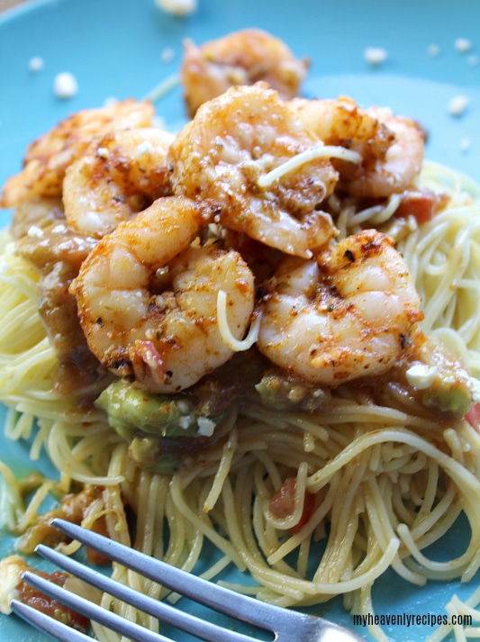 If you love shrimp, guacamole and pasta you're going to love this Spicy Shrimp Pasta Recipe. Plus, it's on the table in under 20 minutes!