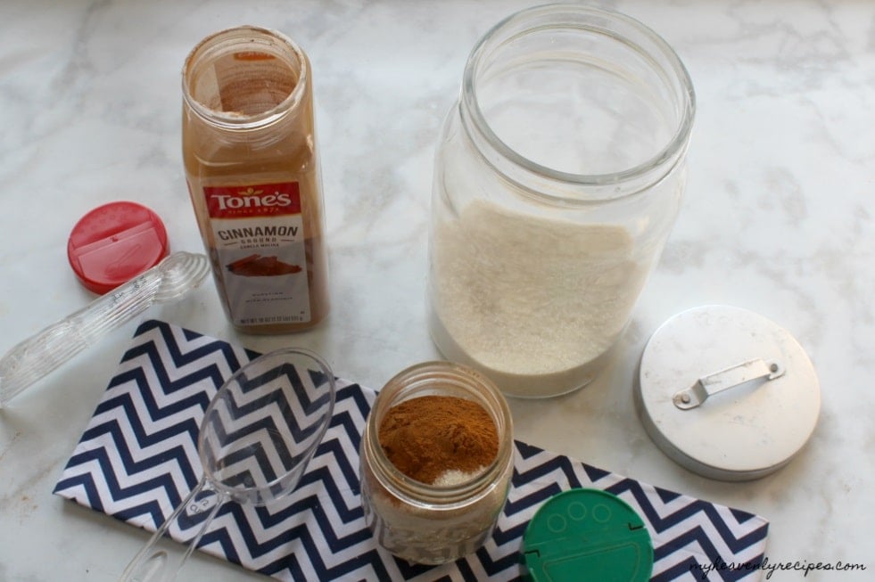 There's nothing more than a mason jar, lid, measuring cup and tablespoon needed to make this Cinnamon Sugar Mixture.