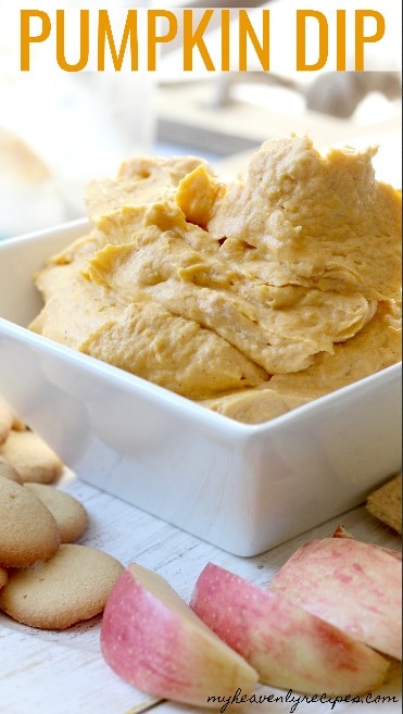 pumpkin dip recipe served in white bowl with apples and vanilla wafers