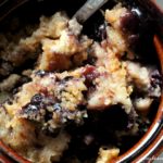 blueberry dump cake close up in bowl