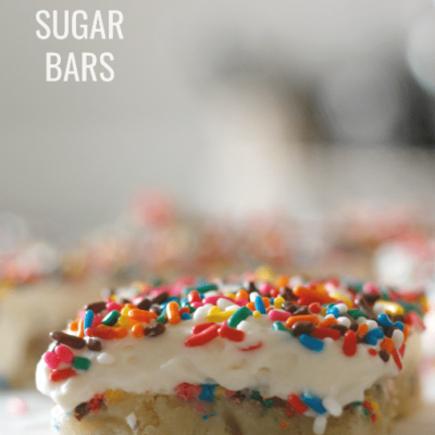 funfetti sugar cookie bar single side view with blurred background