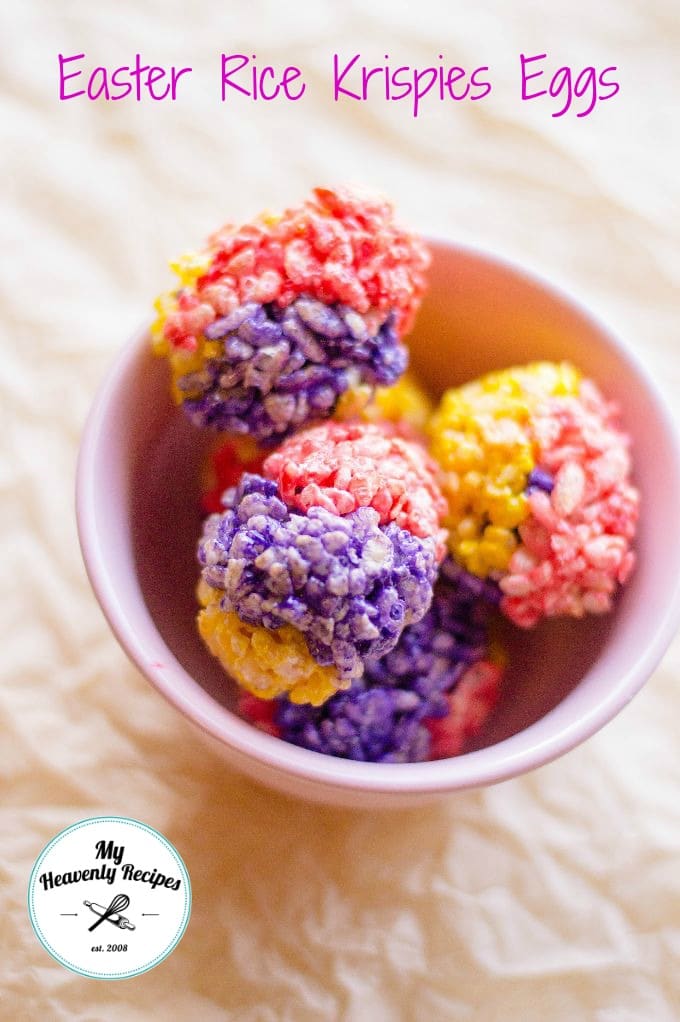 overhead view of four colorful Rice Krispies Easter eggs in a bowl