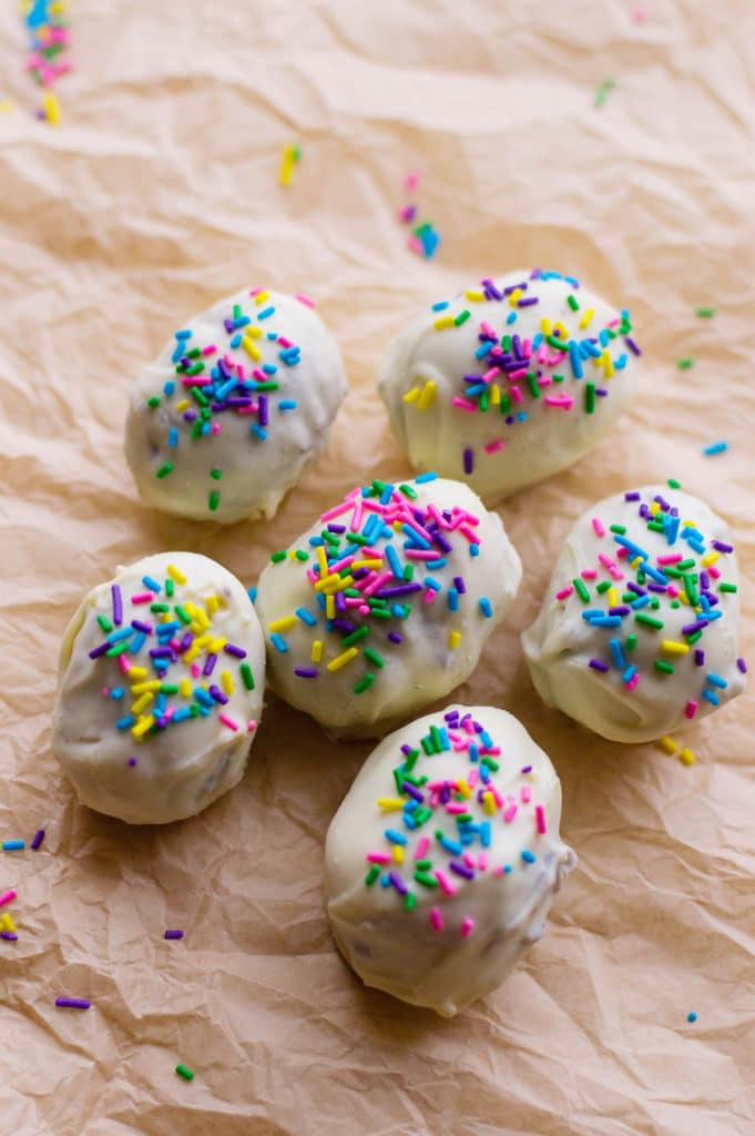 Easter Oreo truffles on top of crumpled parchment paper