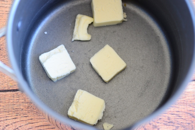 In a large skillet melt butter over medium heat.