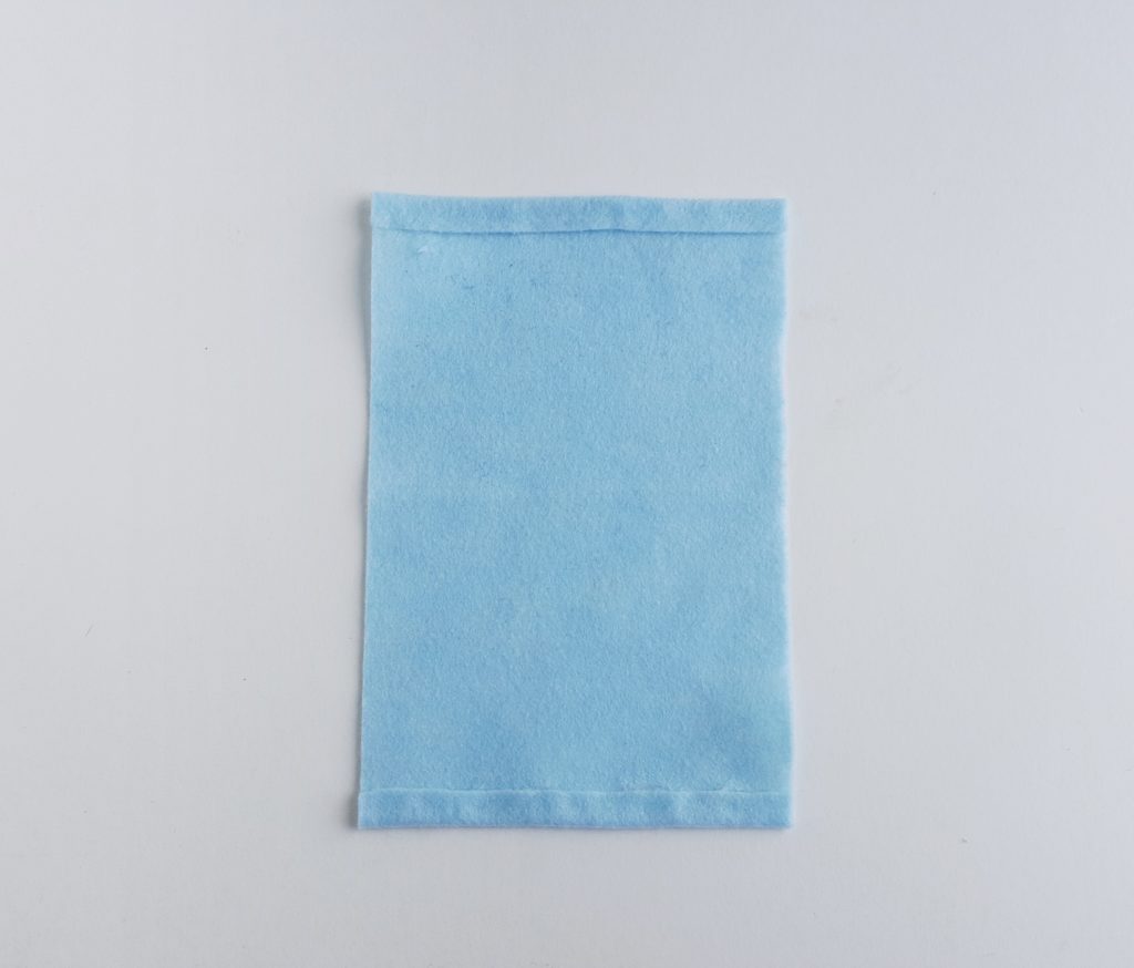 piece of blue fabric for unicorn pencil case
