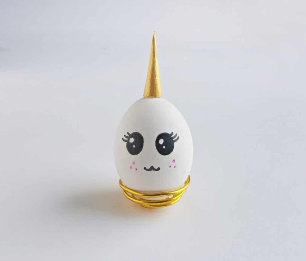 unicorn egg with unicorn horn in gold