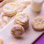 lemon crinkle cookies with a glass of milk