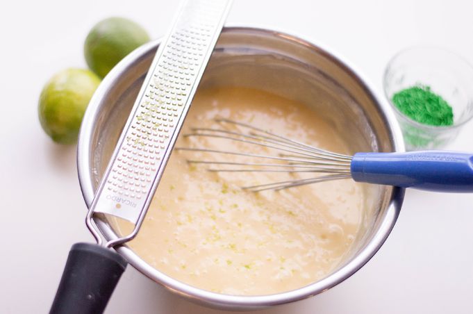 margarita cupcakes batter in a bowl with lime grated into it