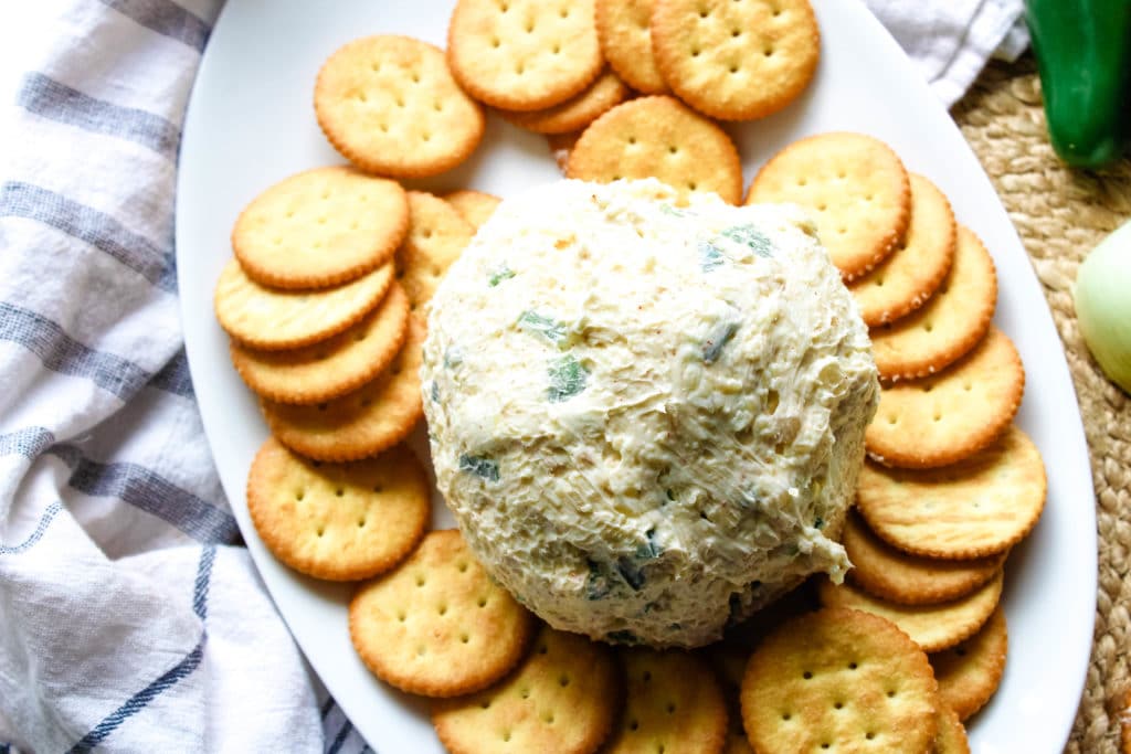 jalapeno dip on a plate with crackers