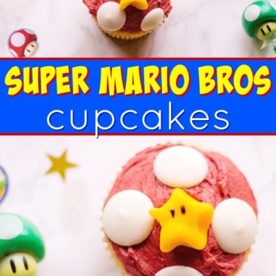 overhead view of two super mario cupcakes with super mario trinkets around