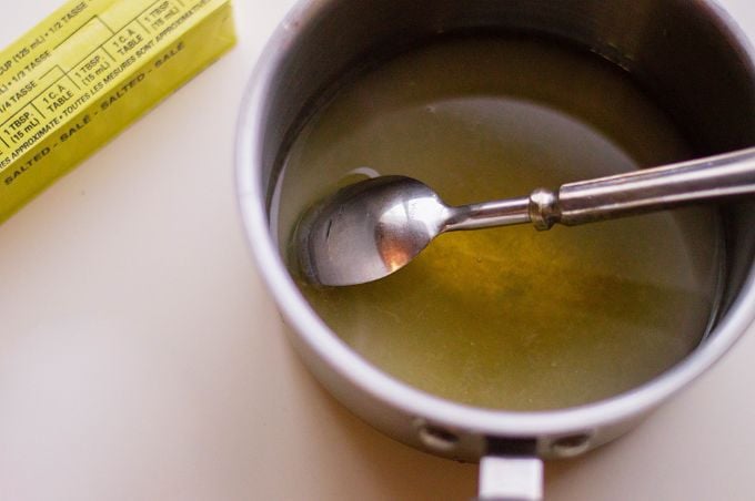 overhead view of caramel drizzle in a pan for caramel cupcakes