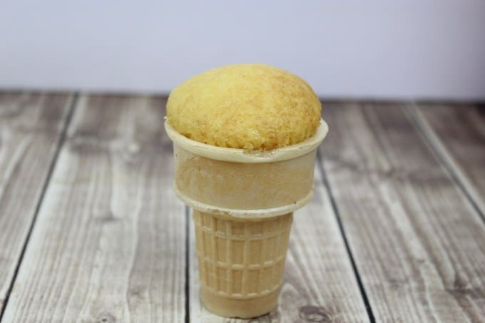 ice cream cone cupcake placed into a ice cream cone