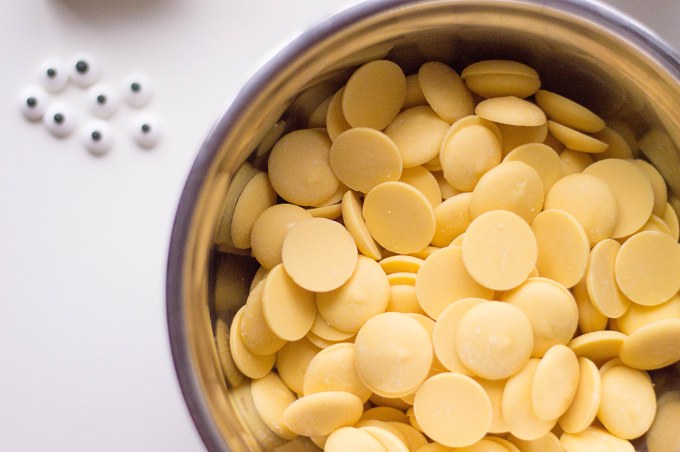 bowl of yellow candy melts to be used for minion oreos