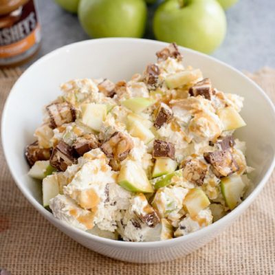 This caramel apple Snickers is a fun fall recipe will get your kids to really rethink their definition of what a salad is! Perfect for potlucks and entertaining, this autumn treat is a family favorite and so, so easy. #salad #snickers #caramel #apple #kidfriendly