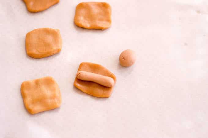 Use flattened caramel candies as your "hot dogs".