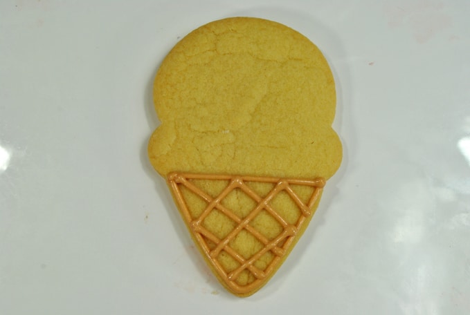 Pipe out criss cross lines onto the ice cream cone
