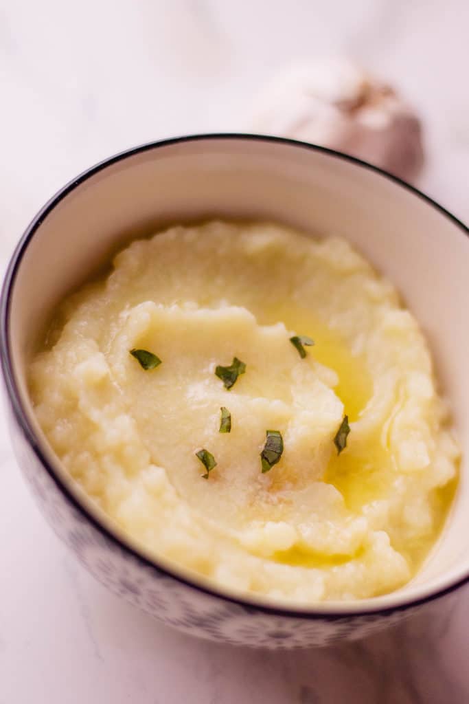 close up of mashed cauliflower in a bowl