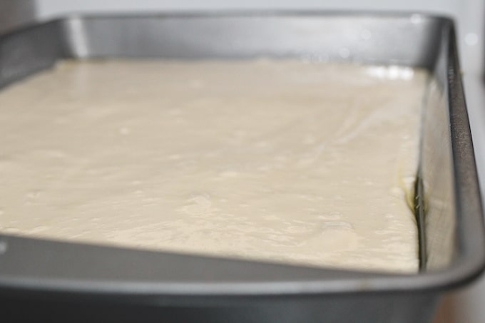 Pour over cake batter and spread evenly.