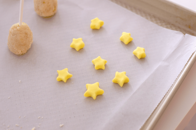 cone shaped cake pops, yellow fondant stars