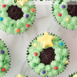 chocolate cupcakes with green icing on black background