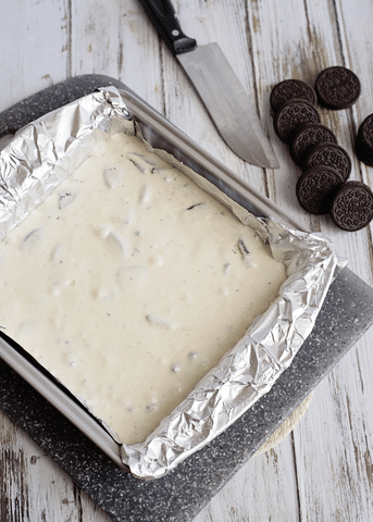oreo cheesecake mixture, baking sheet, oreo cookies