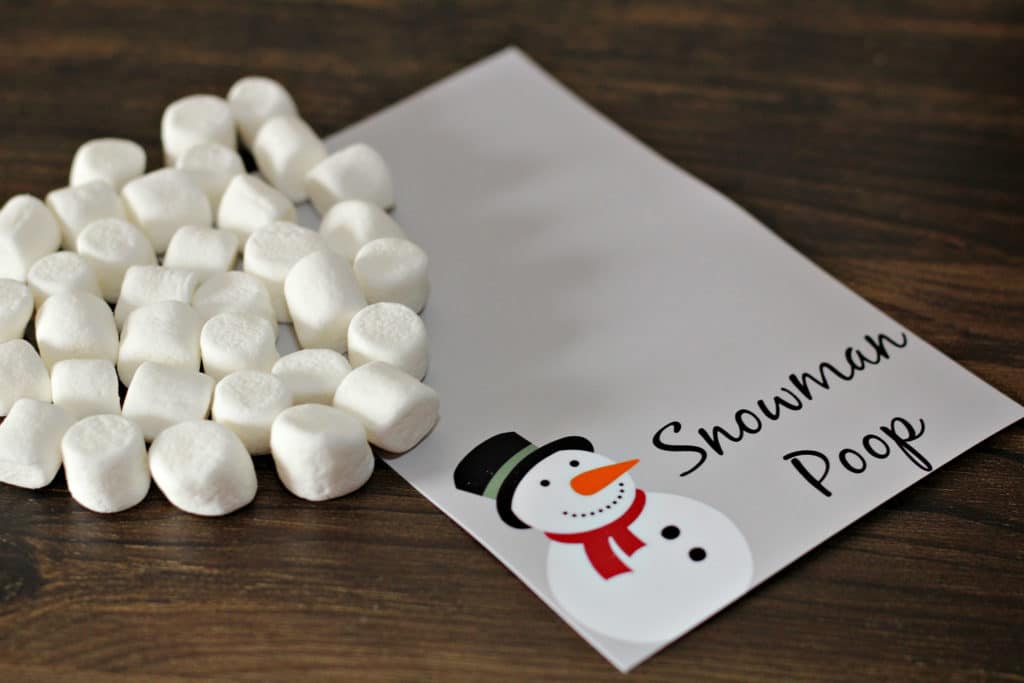 snowman poop printable on table with mini marshmallows